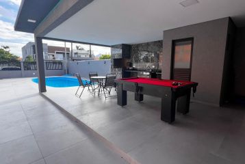 CASA COM PISCINA NO RIVIERA REF684CA